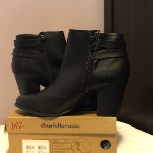 Black buckle ankle boots